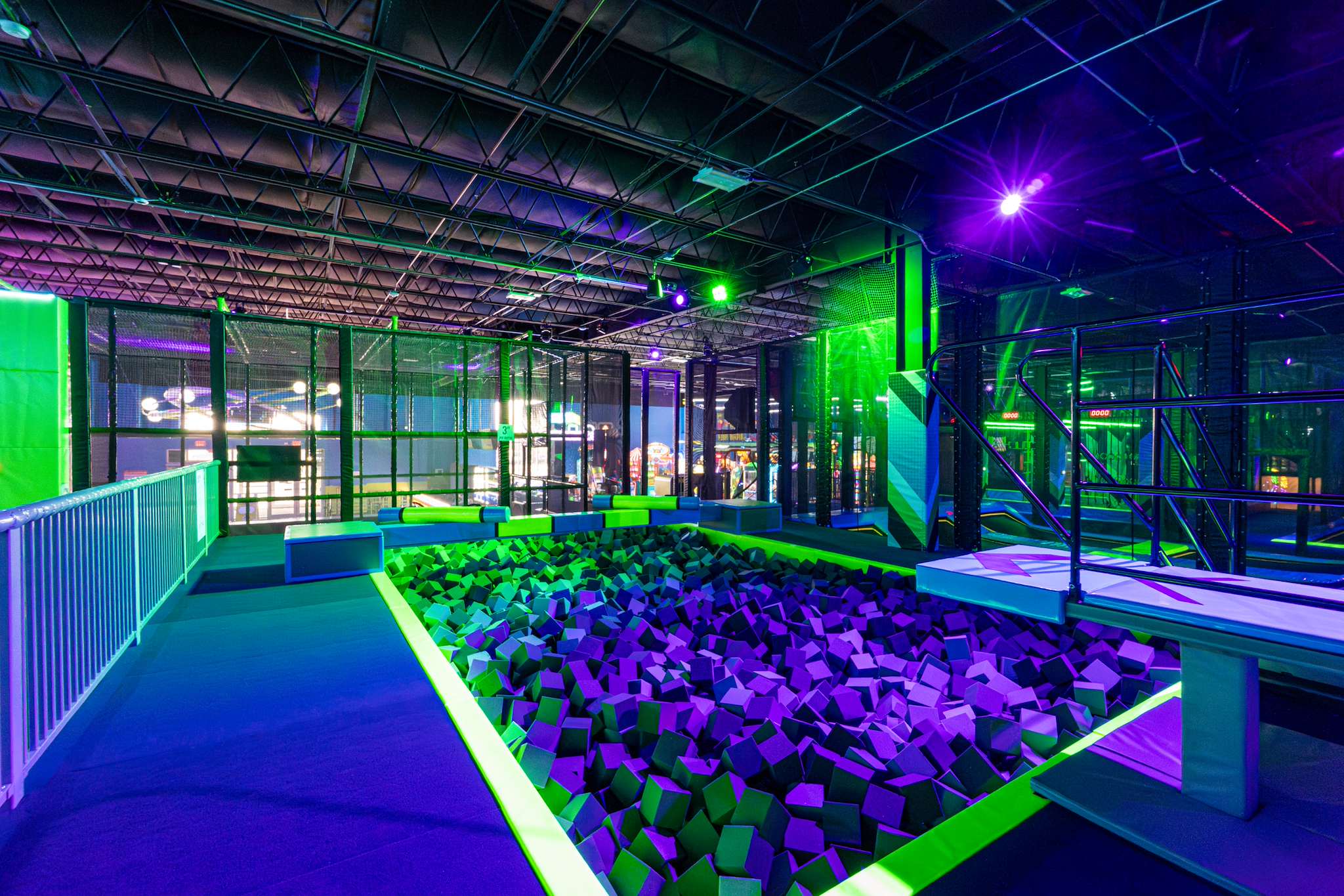 Foam pit with purple and green blocks at NRG Fargo